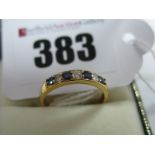 An 18ct Gold Alternately Claw Set Half Eternity Style Ring, stamped ''DIA'' ''0.21''.