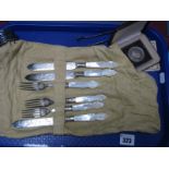 A Highly Decorative Set of Three Mother of Pearl Handled Dessert Knives and Forks, plated sugar