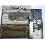 ZODIAC Electro Massage Machine, in original fabric pouch and box with leaflet; novelty camera