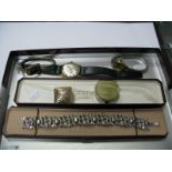 Montine Gent's Wristwatch, bark textured costume bracelet, ladies wristwatches, pill boxes.