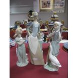 Lladro Figurine 'Waiting to Feed The Goose', '1052' 23.5cm high, another 'Cuddling Cat' '5743',