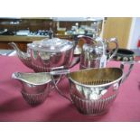 A Matched Plated Four Piece Plated Tea Set, each of oval semi reeded form; together with a lidded