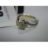 A Modern 18ct Gold Single Stone Diamond Ring, the brilliant cut stone, claw set, between two tone