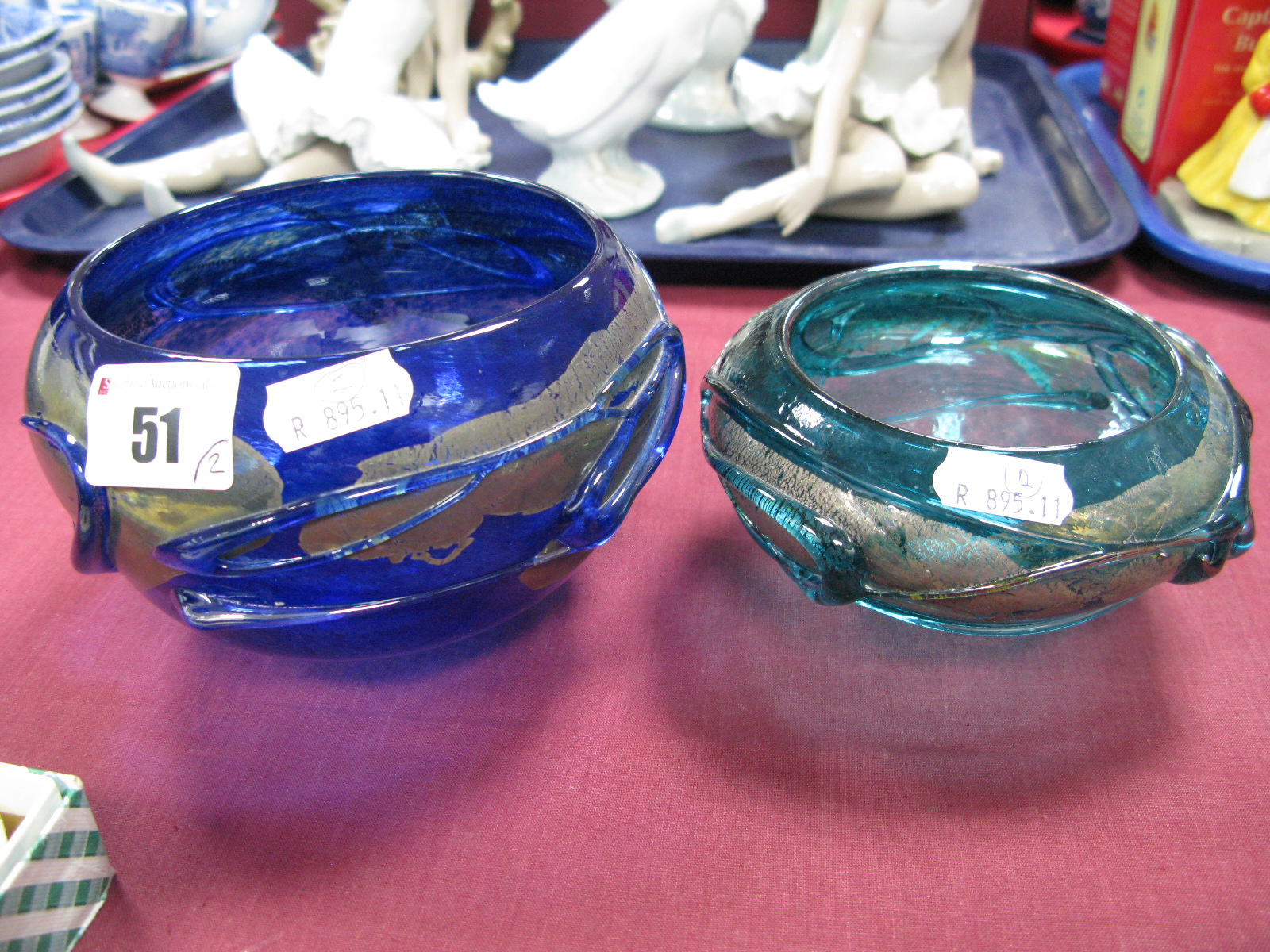 A Greenhalgh Mottled Blue Glass Bowl, the upper body with trail design on fused metallic band,