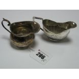 A Small Hallmarked Silver Jug, with bead and reed border, another small hallmarked silver jug, of