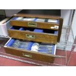 W.R. Humphrey's & Co Plated Part Canteen of Cutlery, contained in a fitted three drawer chest.