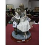 Lladro Figurine of 'Precocious Ballerina' '5793' 25cm high, together with stand.