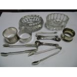 Hallmarked Silver and Other Napkin Rings, plated sugar tongs, pressed glass salts, etc.