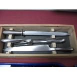 A David Mellor Stainless Four Piece Steel Carving Set, in wooden box.