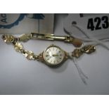 Accurist; A 9ct Gold Cased Ladies Wristwatch, the signed dial with line markers, to 9ct gold