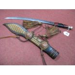 Bushman's Knife in the Polynesian Manner, having leather handle, in a straw work and leather