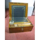 A Mid XIX Century Walnut Brass Bound Writing Box, with fitted interior, black leather insert.