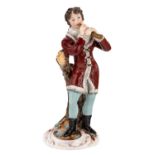 A RUSSIAN PORCELAIN FIGURE OF A BOY PLAYING FLUTE, POPOV PORCELAIN FACTORY, FIRST HALF OF 19TH CENT.