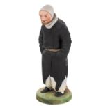 AN EARLY SOVIET PORCELAIN FIGURE OF PLIUSHKIN FROM GOGOLÕS DEAD SOULS, DMITROVSKAYA PORCELAIN 1920s