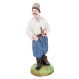 A PORCELAIN FIGURE OF A MALOROSS WITH A PIPE, FROM THE "PEOPLE OF RUSSIA" SERIES, GARDNER PORCELAIN