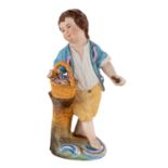 A RUSSIAN PORCELAIN FIGURE OF A BOY WITH A FLOWER BASKET, POPOV PORCELAIN FACTORY, 19TH CENTURY