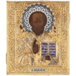 A RUSSIAN ICON OF ST. NICHOLAS THE WONDERWORKER WITH GILT SILVER AND SHADED ENAMEL OKLAD, 1908-1917