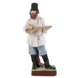 A RUSSIAN PORCELAIN FIGURE OF A BALALAIKA PLAYER, GARDNER PORCELAIN FACTORY MOSCOW LATE 19TH CENTURY