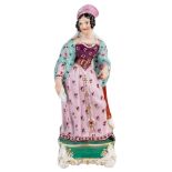 A RUSSIAN PORCELAIN FIGURE OF A BOURGEOIS WOMAN, LATE 19TH CENTURY