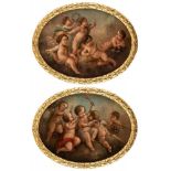 A PAIR OF EARLY 19TH CENTURY OVAL PAINTINGS OF CHERUBIM