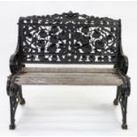 A TWO-PERSON WROUGHT IRON BENCH