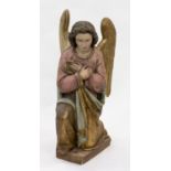 A POLYCHROME WOODEN ANGEL, LIKELY COLONIAL LATIN AMERICAN