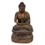 A LARGE GILT WOODEN FIGURE OF BUDDHA SHAKYAMUNI, LIKELY LATE 18TH CENTURY