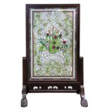 A CONTEMPORARY STAINED GLASS FIRE SCREEN WITH WOODEN FRAME