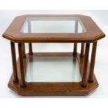 A CONTEMPORARY WOODEN COFFEE TABLE WITH GLASS TOP