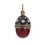 A FABERGE PURPURINE, GOLD AND DIAMOND EGG PENDANT, WORKMASTER HENRIK WINGSTROM, ST. PETERSBURG