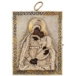 A RUSSIAN TRAVELING ICON OF THE THE VIRGIN OF TENDERNESS (UMILENIE) WITH GILT SILVER AND SEED PEARL