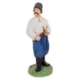 A RUSSIAN PORCELAIN FIGURE OF A MALOROSS WITH A PIPE, FROM THE "PEOPLE OF RUSSIA" SERIES, GARDNER
