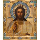 A RUSSIAN ICON OF CHRIST PANTOCRATOR WITH GILT SILVER, CLOISONNE AND CHAMPLEVE ENAMEL OKLAD