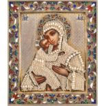 A RUSSIAN ICON OF THE VLADIMIRSKAYA MOTHER OF GOD WITH GILT SILVER, SEED PEARL AND ENAMEL OKLAD