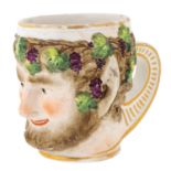 A RUSSIAN PORCELAIN CUP IN THE FORM OF THE HEAD OF BACCHUS, GARDNER PORCELAIN FACTORY, VERBILKI