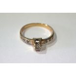 9 CT. GOLD SOLITAIRE RING