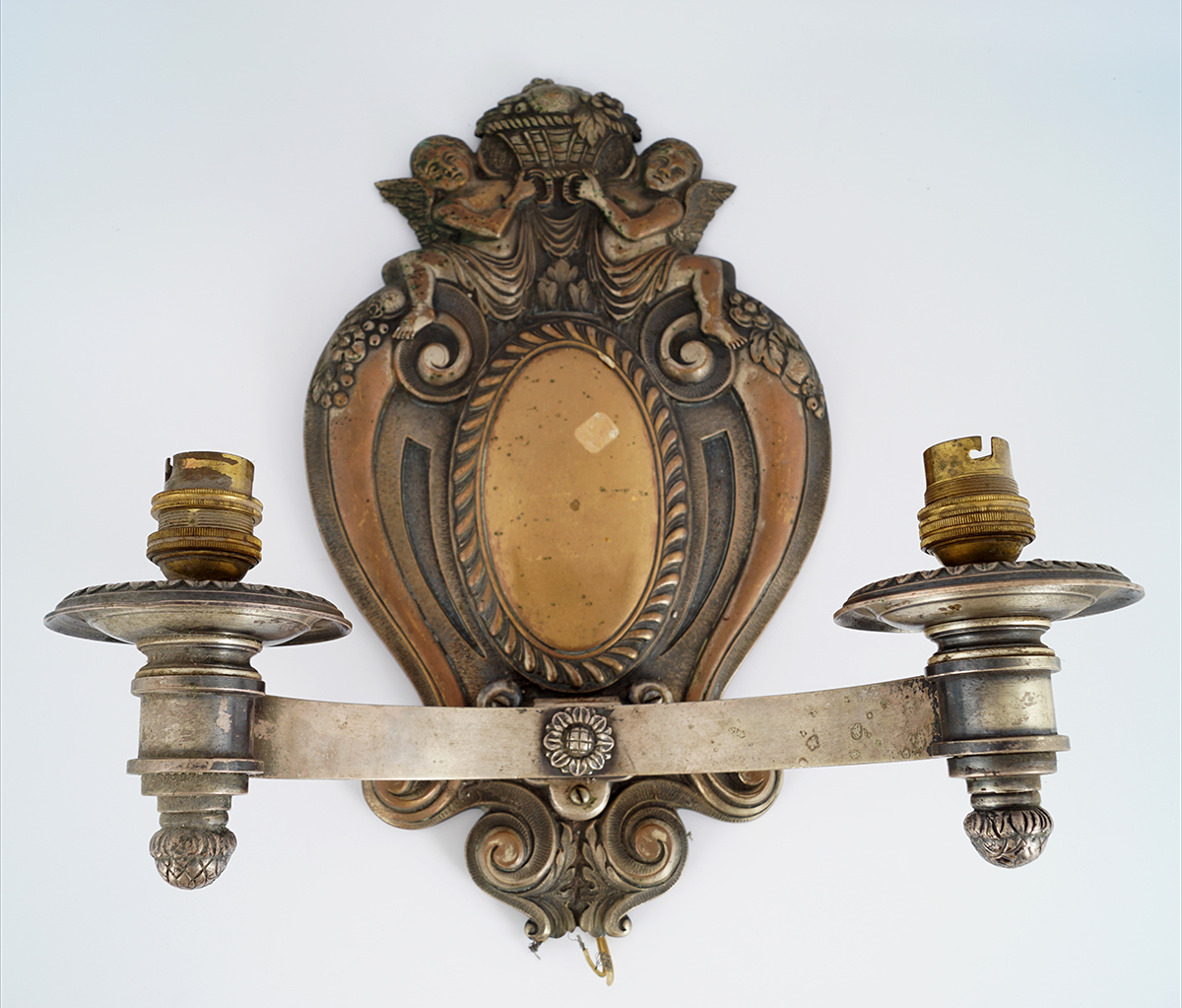 19TH-CENTURY CHERUB MOUNTED ARMORIAL WALL LIGHT