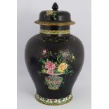 CARLTON WARE PAINTED BLACK GLAZED VASE AND COVER