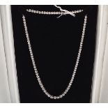 18 CT. WHITE GOLD GRADUATED DIAMOND NECKLACE