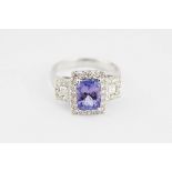 18 CT. WHITE GOLD TANZANITE AND DIAMOND RING