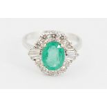 18 CT. WHITE GOLD EMERALD AND DIAMOND RING
