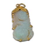 24 CT. GOLD CARVED JADE (PEACHES) PENDANT
