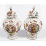PAIR OF FRENCH PORCELAIN URNS AND LIDS