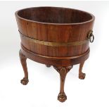 19TH-CENTURY MAHOGANY AND BRASS BOUND LOG BARREL