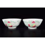 PAIR OF IMPORTANT CHINESE FAMILLE ROSE PEACH BOWLS