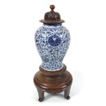 PAIR OF CHINESE QING BLUE AND WHITE URNS