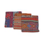 PERSIAN RUG FRAGMENT COVERED CUSHIONS