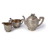 CHINESE THREE PIECE SILVER TEA SERVICE, C. 1900