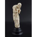 NINETEENTH-CENTURY IVORY ISLAMIC FIGURE