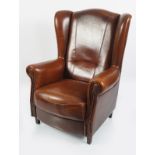 DESIGNER HIDE UPHOLSTERED WING ARMCHAIR